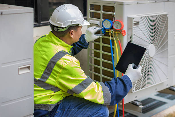 Professional Hvac technician working in Portland, MI